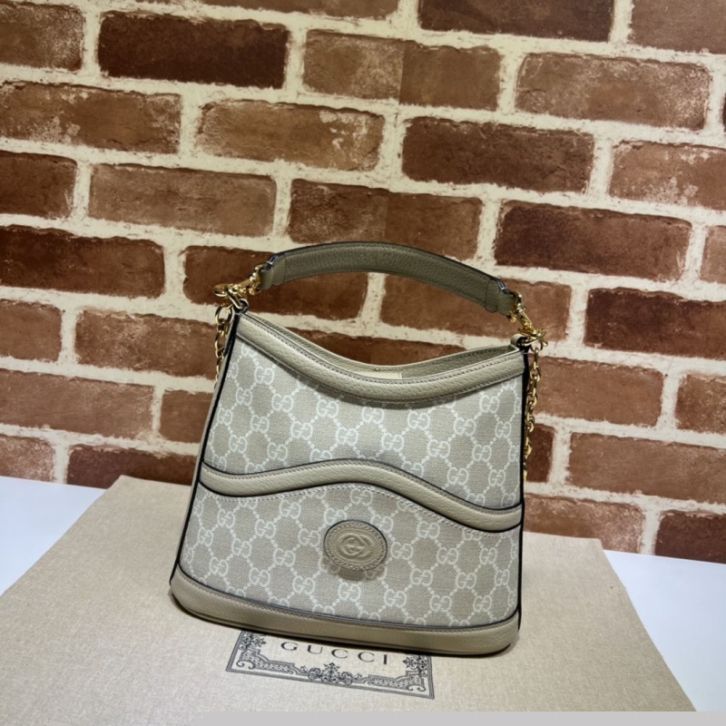 G*u*i top handle bags